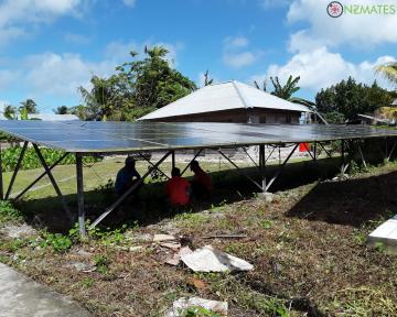 NZMATES team assessing the solar panels of the Watmasa plant.
